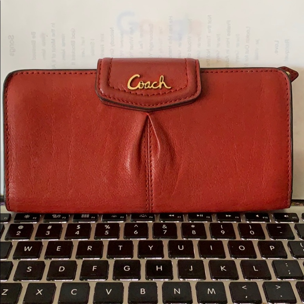 Nice red and gold coach wallet —